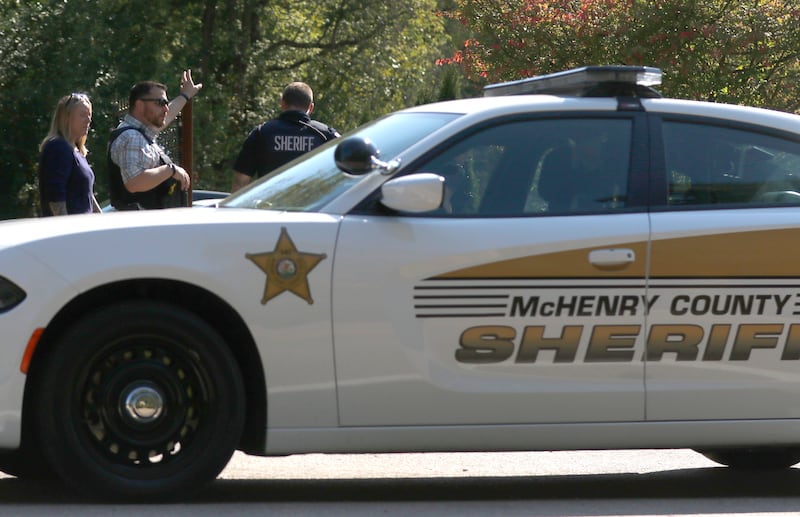 McHenry County Sheriff’s deputies investigate a shooting in the 8900 block of East Tryon Grove Road Thursday, Oct. 10, 2024.
