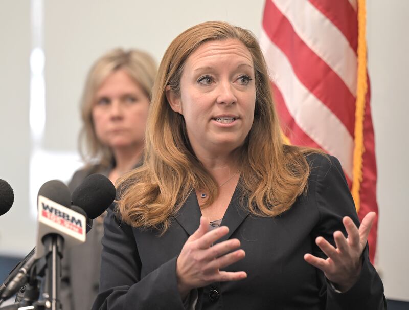 Kane County States Attorney Jamie Mosser speaks at a press conference announcing the formation of a Human Exploitation Unit at the St. Charles Police Department on Monday, March 17, 2025. Behind her is St. Charles Mayor Lora Vitek.