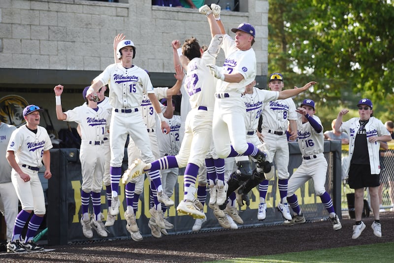 The Wilmington baseball team celebrates a home run from Ryan Kettman, back turned, during the Class 2A Herscher Sectional semifinal against Manteno Wednesday, June 3, 2026.