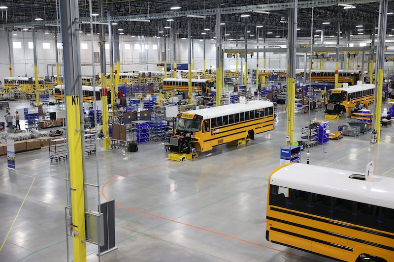Dozens of buses are assembled at the Lion Electric manufacturing facility on Friday, July 21st, 2023 in Joliet.