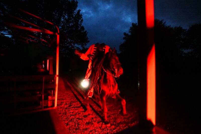 The Headless Horseman rides by attendees during a performance of "A Night In Sleepy Hollow," hosted by the Kankakee Valley Theatre Association at Perry Farm in 2023.