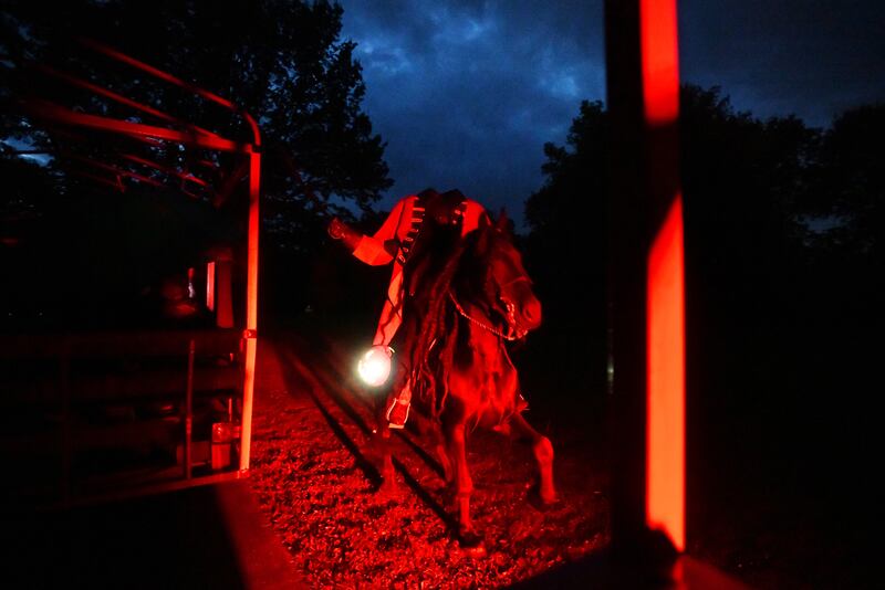 The Headless Horseman rides by attendees during a performance of "A Night In Sleepy Hollow," hosted by the Kankakee Valley Theatre Association at Perry Farm in 2023.