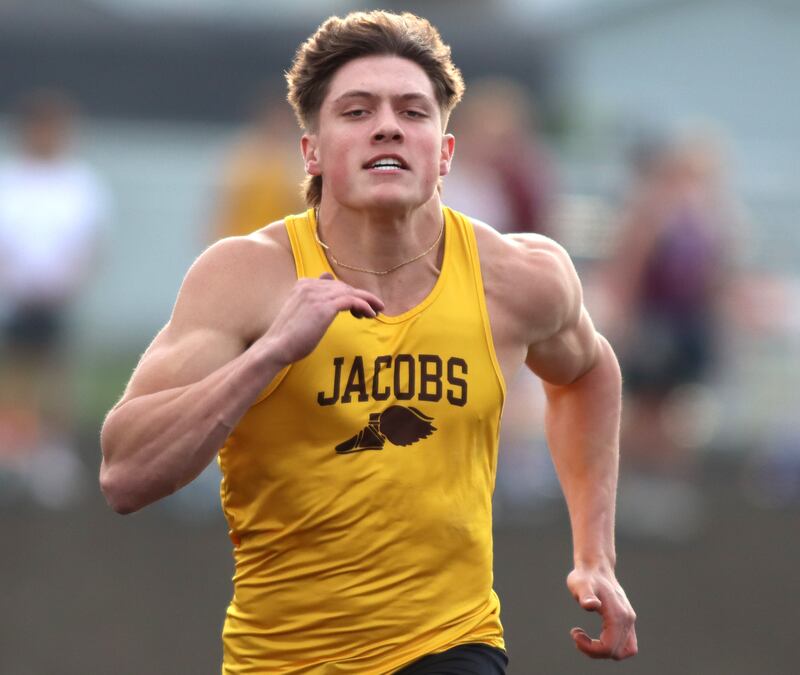 Jacobs’ Matt Scardina competes in the 100-meter dash during the McHenry County Track and Field Meet at McCracken Field on Thursday, April 24, 2025, in McHenry