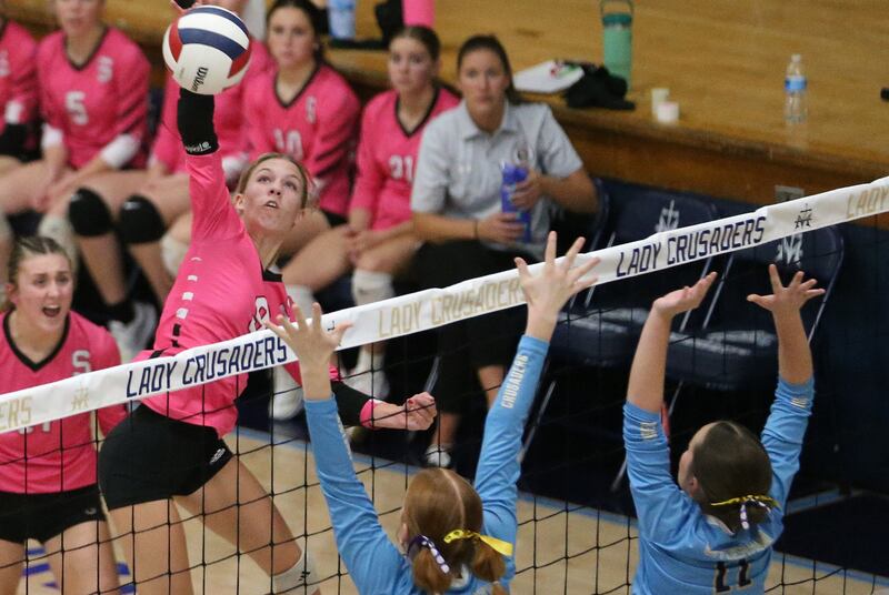 Serena's Aubrey Duffy spikes the ball against Marquette on Wednesday, Oct. 22, 2025 in Bader Gymnasium at Marquette High School.