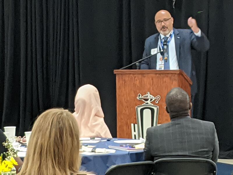 Dist. 308 Superintendent Andalib Khelghati addresses those attending the first Annual SD 308 District Dialogue: CommUNITY in Education event June 11 at Oswego High School.