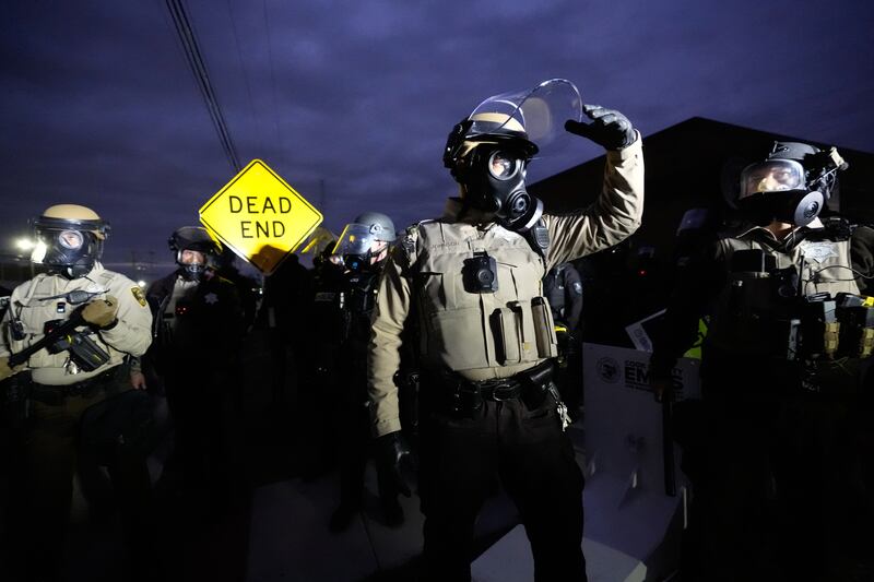 Law enforcement standoff with protesters outside an ICE processing facility in the Chicago suburb of Broadview, Ill., Saturday, Nov. 1, 2025. (AP Photo/Alex Brandon)