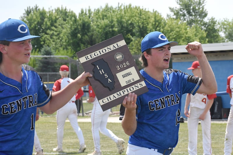 Clifton Central's Brayden Meents, left, and Blake Chandler bring the Class 1A Clifton Central Regional championship plaque to their teammates after defeating St. Anne 2-0 in the championship game Saturday, May 30, 2026.