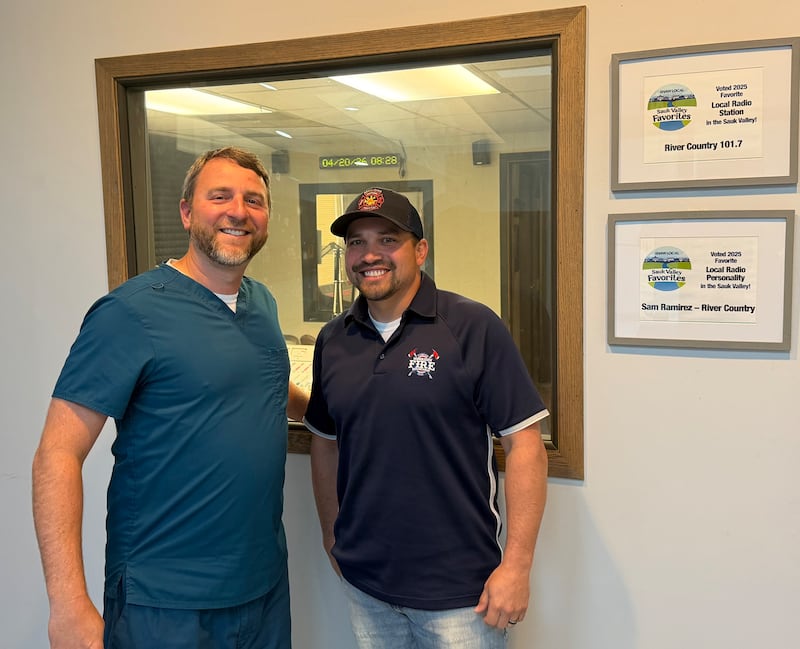 Brad Yaklich (left) with the Morrison Dept. of Fun and Tony Vanderleest (right) with the Morrison Fire Dept. visit the WIXN radio station in Dixon on April 20, 2026.