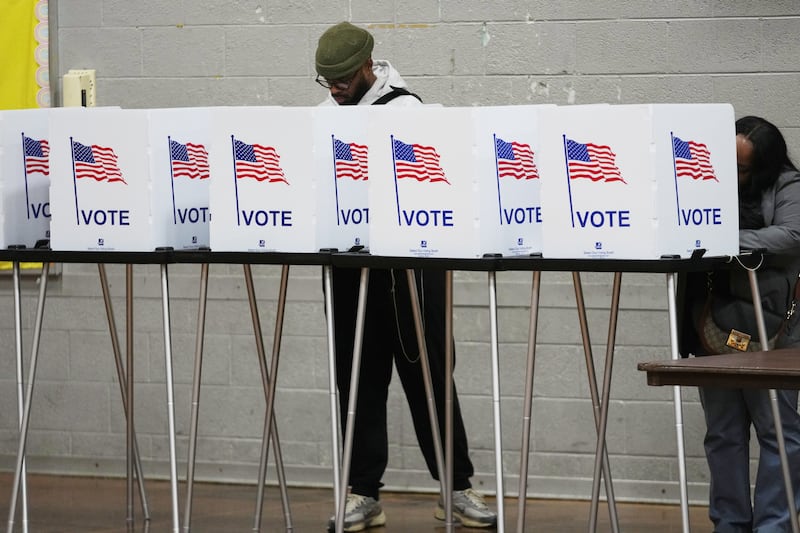 FILE - Voters fill out their ballots Nov. 4, 2025, in Detroit. (AP Photo/Paul Sancya, File)
