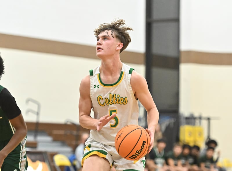 Providence Catholic's Eli Phillips (5) in action during the WJOL tournament game against Plainfield Central on Friday, NOV. 28, 2025, at Joliet.