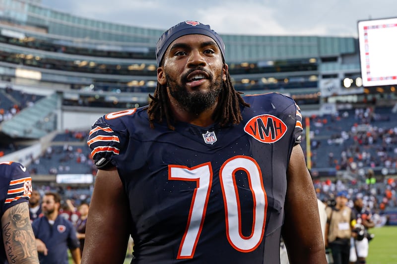 Chicago Bears offensive tackle Braxton Jones (70) walks off the field after an NFL football game against the Dallas Cowboys, Sunday, Sept. 21, 2025, in Chicago. (AP Photo/Kamil Krzaczynski)