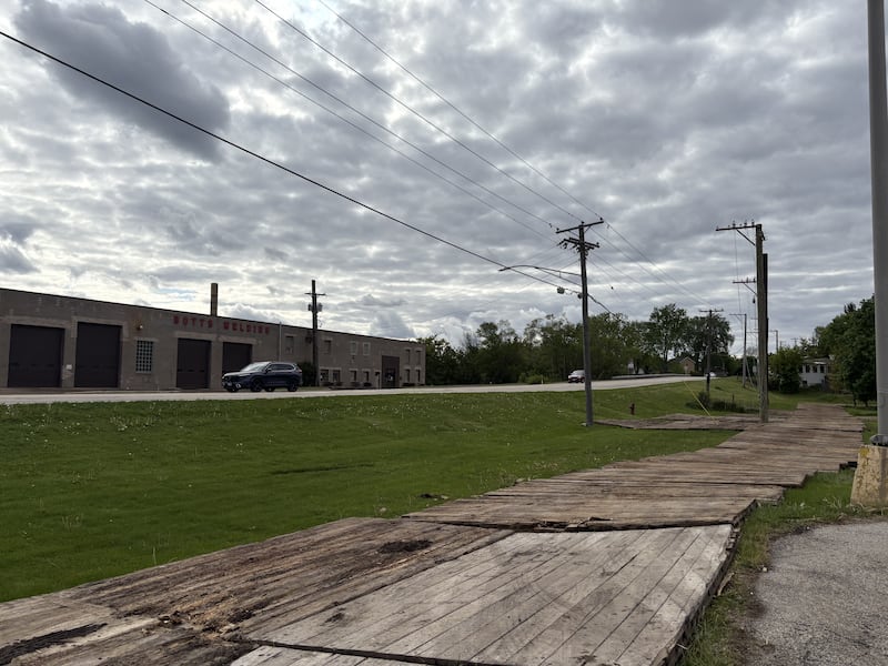Temporary utility poles line Route 47 in Woodstock May 22, 2025.