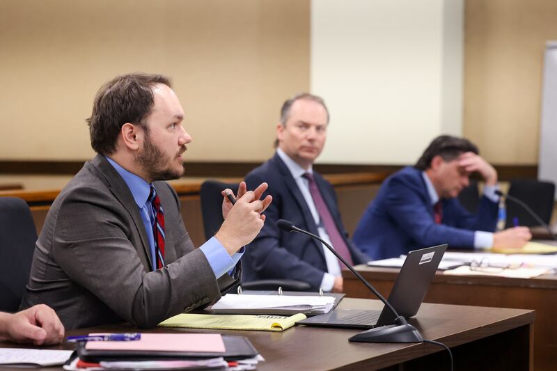 Robby Dube, left, attorney for the Concerned Citizens of Manteno, gives his argument to Circuit Judge Lindsay Parkhurst during the Concerned Citizens of Manteno vs. Village of Manteno & Gotion Inc. court hearing in the 21st Judicial Court in Kankakee on Wednesday, May 14, 2025. Joe Cainkar, attorney for the village of Manteno, right, and David Streicker, attorney for Gotion Inc., listen from the defense side.