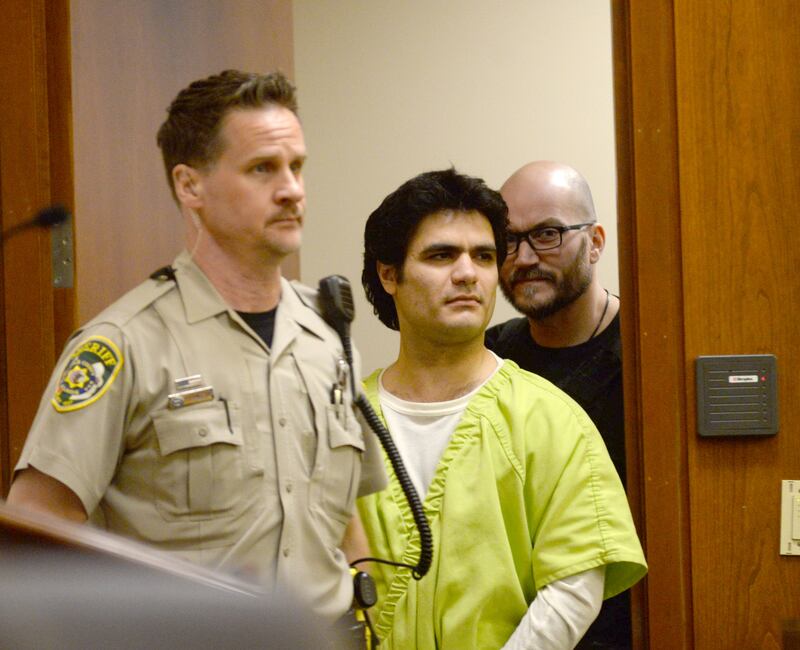 Jonathon Gounaris is escorted into a courtroom by Winnebago and Ogle County deputies at the Ogle County Judicial Center in Oregon on Monday, April 7, 2025, for a pretrial release hearing.