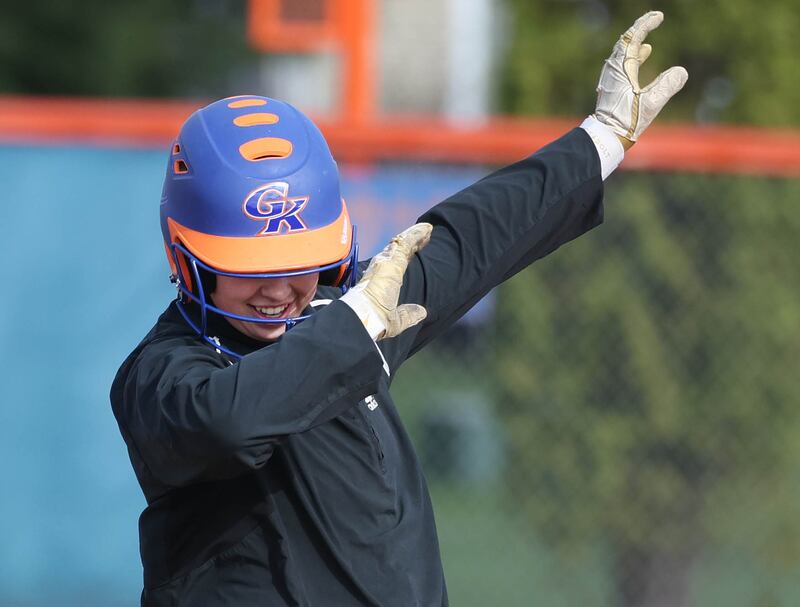 Genoa-Kingston’s Elizabeth Davis pulls off a little dab as she arrives safely at second base during their game against Winnebago Monday, April 21, 2025, at Genoa-Kingston High School.