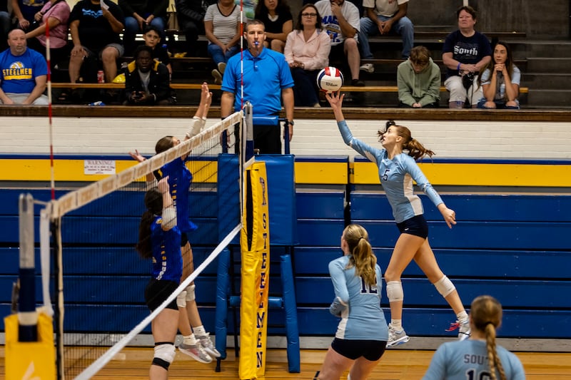 Plainfield South's Kaitlyn Wagnon taps the ball over the net during a varsity volleyball away game against Joliet Central on Sept. 18, 2025.
