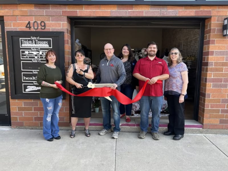 A ribbon cutting ceremony was recently held to celebrate the opening of Trinkets & Treasures in downtown Streator. From left: Rikki Clayton, store owner Fran Clayton, Chamber Board President Ben Hiltabrand, Mayor Tara Bedei, and Chamber ambassadors Ian Ernst and Judy Booze.