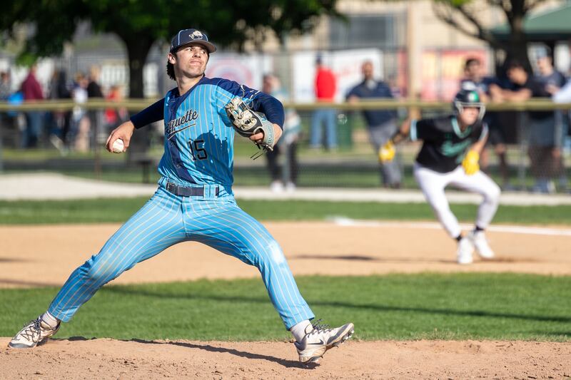 Alec Novotney (15) of Marquette pitches on Thursday, May 8, 2025 at Masinelli Field in Ottawa.