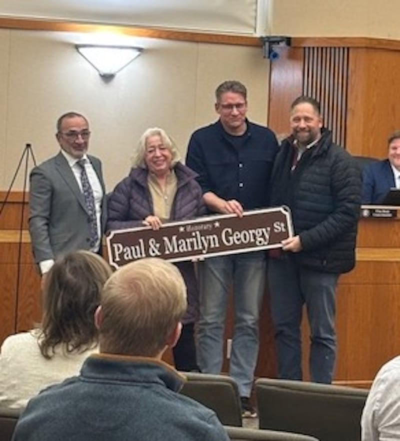 The Georgy family, standing with Crystal Lake Mayor Haig Haleblian (left), received the honorary street sign during the city council meeting on Jan. 20, 2026.