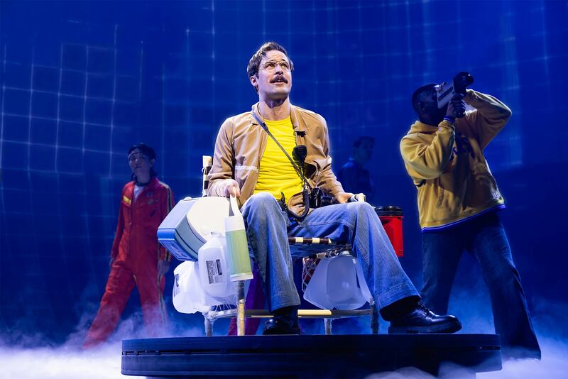 Charlie McCullagh as Larry Walters in Chicago Shakespeare’s North
American premiere production of 42 Balloons, a soaringly original musical
inspired by the crazy but true story of a man with 42 weather balloons, a
lawn chair, and a dream, written by Jack Godfrey and directed by Ellie
Coote. Running May 24–June 29, 2025, in The Yard at Chicago Shakespeare.