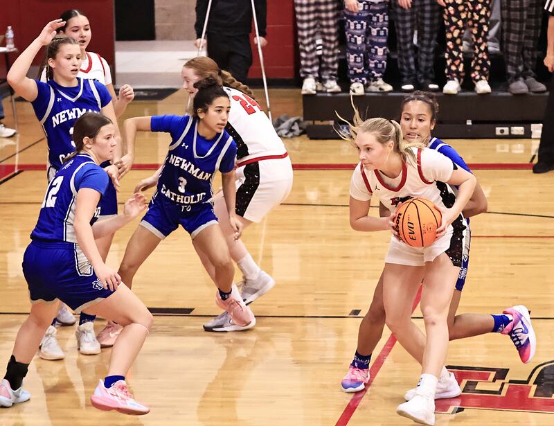 EP Panther Lauren Abbott and Newman Comet Gisselle Martin battle for the rebound Thursday, Dec. 11, 2025. The Panthers lost to the visiting Comets.