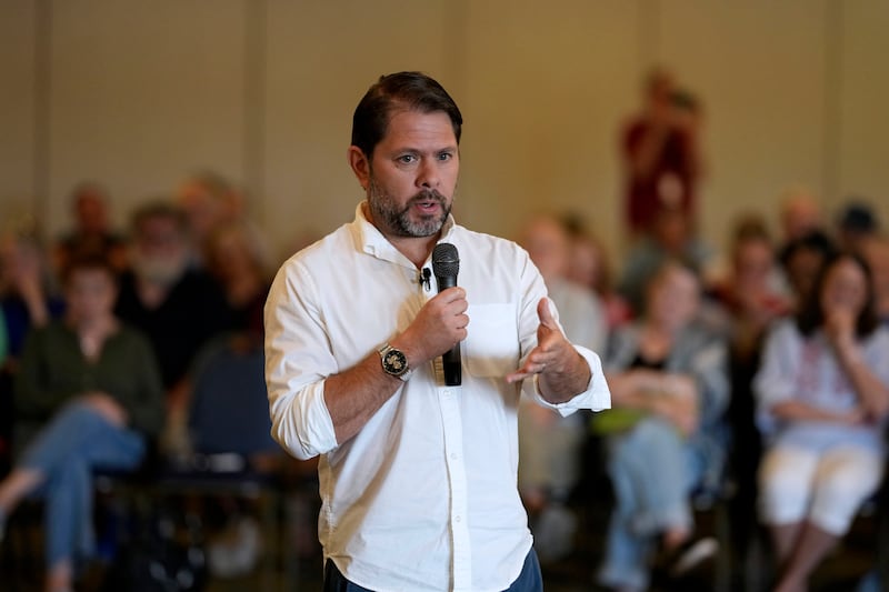 Sen. Ruben Gallego, D-Ariz., speaks during a town hall meeting, Saturday, Aug. 9, 2025, in Davenport, Iowa. (AP Photo/Charlie Neibergall)