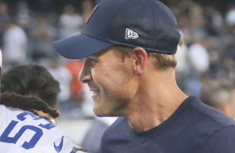 Chicago Bears head coach Ben Johnson smiles while walking off of the field after beating the Dallas Cowboys on Sunday, Sept. 21, 2025 at Soldier Field.