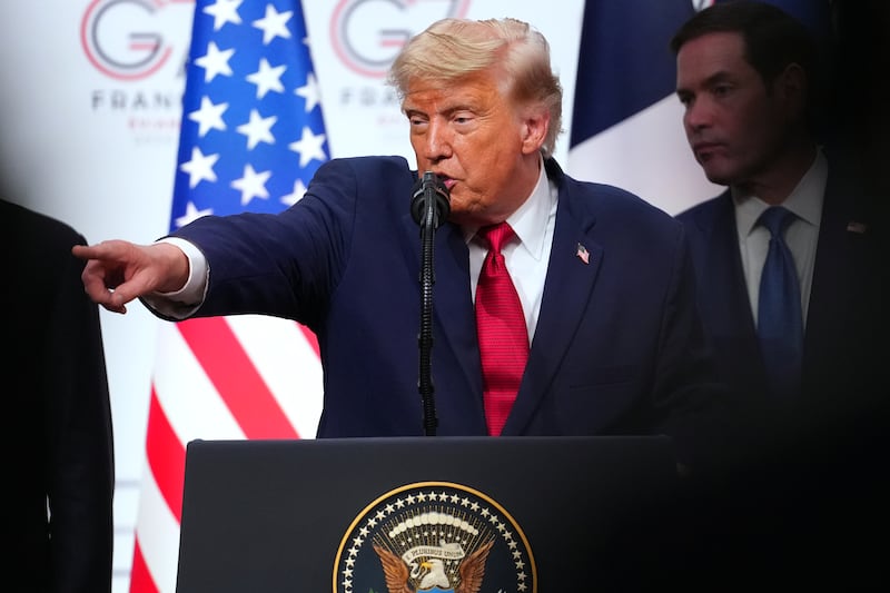 U.S. President Donald Trump, center, takes questions during a media conference at the end of the G7 summit in Evian-les-Bains, France, Wednesday, June 17, 2026. (AP Photo/Vadim Ghirda)