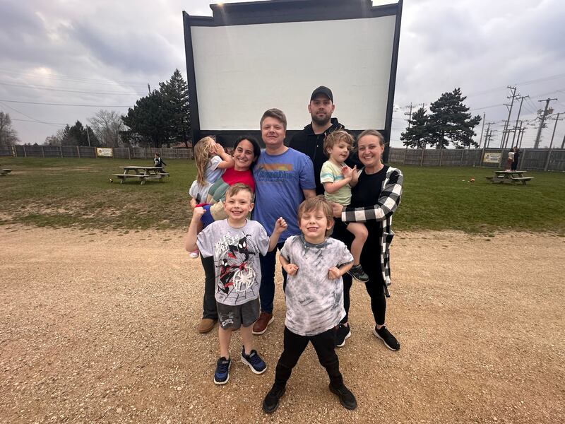 The Cifonelli and Carlson families enjoy a night out at the McHenry Outdoor. This season, families and friend groups may become social media influencers for the theater. For information, visit goldenagecinemas.com.