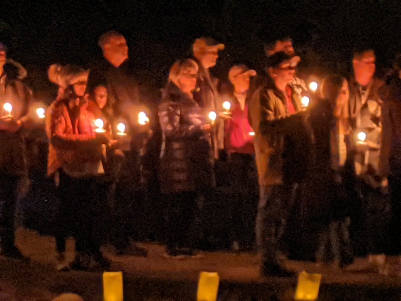 Many people gathered Sunday for a candlelight vigil for Grace Diewald, 20, and her brother, Emil, 19, who were killed after the Lexus SUV were riding in crashed into the back of a District 301 school bus Oct. 31.
