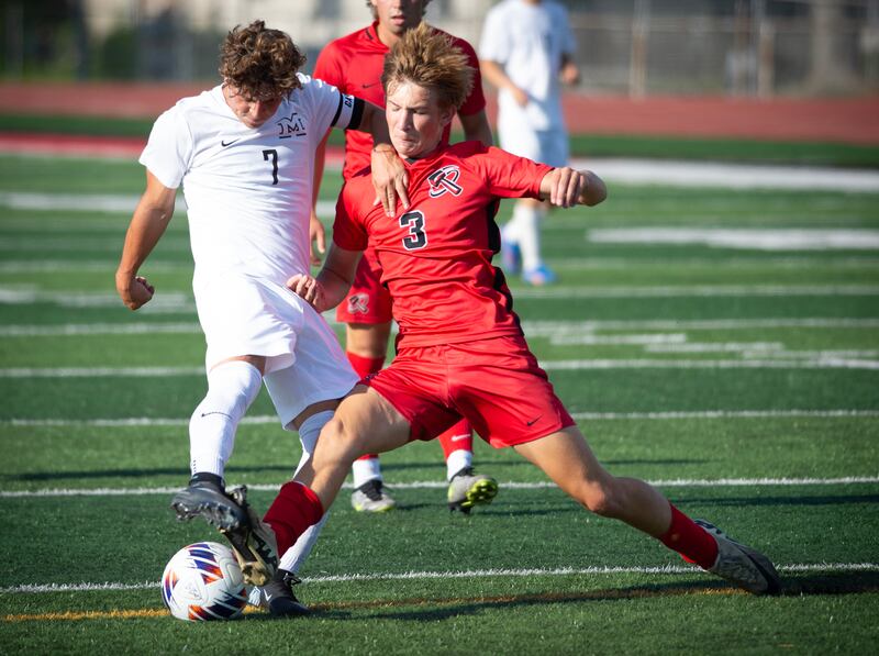 Minooka's Ethan Koranda, left, looks for a shot on goal as Bradley-Bourbonnias' Alek Perkins defends in a game on Tuesday, August 26, 2025.