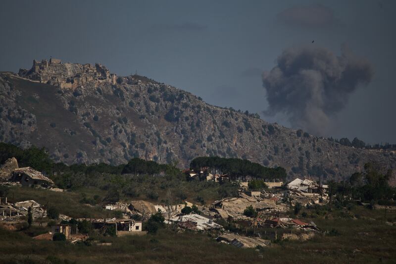 Smoke rises to the sky in an area near Beaufort Castle following an Israeli military strike in southern Lebanon as seen from northern Israel, Friday, June 19, 2026. (AP Photo/Leo Correa)