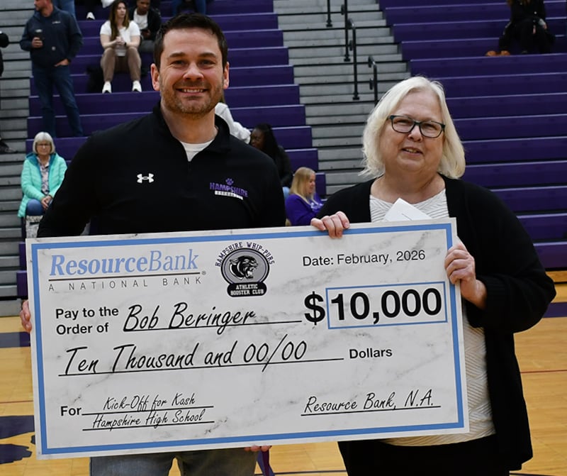 Hampshire High School teacher Bob Beringer (left) and Resource Bank Hampshire branch manager Caroline Toomey