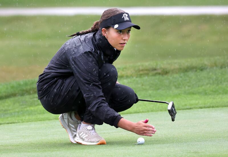 Kaneland’s Kailey Kunstman lines up her putt on the second green Tuesday, Sept. 24, 2024, during the Interstate 8 girls golf tournament at the Sycamore Golf Club.