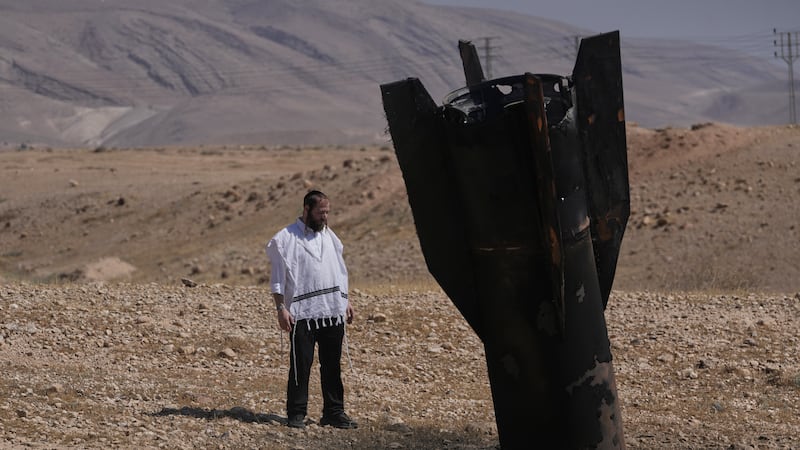 Israel and Iran trade strikes, threatening to drag the region back into full-scale war