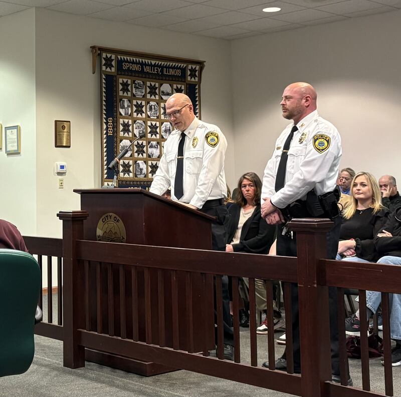 Spring Valley Police Chief Adam Curran announces the promotion of Sergeant Bernie Larson to Deputy Chief during Monday night's City Council meeting at Spring Valley City Hall.