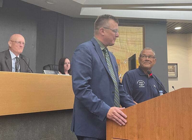 Assistant La Salle County State's Attorney Jeremiah Adams (left) was introduced Thursday, July 10, 2025, to the La Salle County Board by State's Attorney Joe Navarro (right). Adams, a longtime prosecutor, will become county attorney and serve chiefly as adviser to the La Salle County Board.