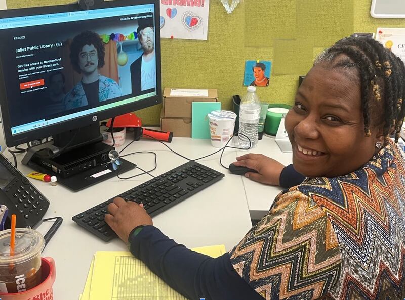 Joliet Public Library Staff Member Jackie Latham tests out Kanopy for access to thousands of movies.