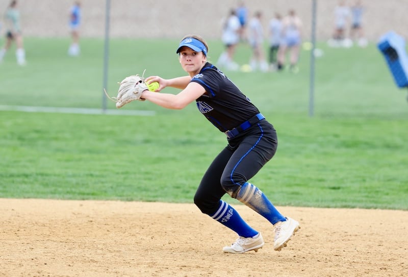 Newman short stop Lucy Oetting fires across the diamond Tuesday at Little Siberia Field.