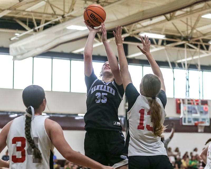 Kankakee's Ava Johnson shoots over the defense at the basekt in their Morris Shootout girls basketball game.  June 18, 2025 in Morris.
