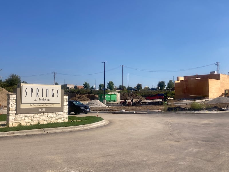Signage for The Springs at Lockport apartment complex across from the proposed site of Mister Carwash on Adelmann Road. 
Monday, September 15, 2025.