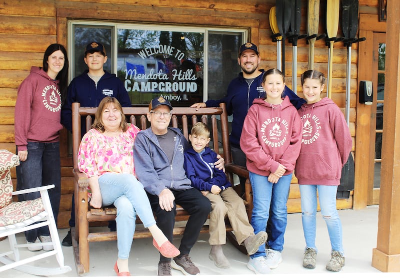 Three generations of the Rogers Family have enjoyed being at Mendota Hills Campground since owners Mark and Susan Rogers (seated) started camping there with their children in 1985. The Rogers' took ownership of the Amboy campground in 2002, and their son Jamie (third from right) and his wife Jessica (left) now are involved in ownership. Jamie and Jessica's children, Sawyer, Oliver, Shiloh and Eden are taking in experiences that their father enjoyed as a kid decades ago.