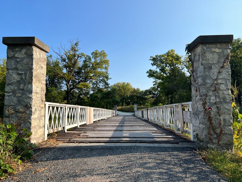 The aging Cenacle bridge runs across the West Branch of the DuPage River.