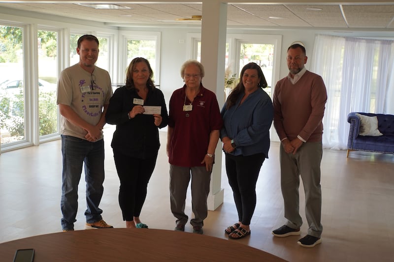 From left to right: Rochelle Rotary Club President Lance Charnock, CAN Board President Michelle Pease, CAN Board Member Pat Burch, Rochelle Rotary Club Member Tricia Herrera, and Rochelle Rotary Club Member Jeff Fiegenschuh.