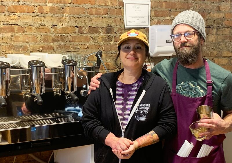 Awaken Cafe + Ripple Effect Arts co-owners Jamie Morris, left, and Jason Schneider, both of Kankakee, stand inside the business they opened on March 1 in the former Steep & Spice Tea Lounge at 223 S. West Ave. in Kankakee.