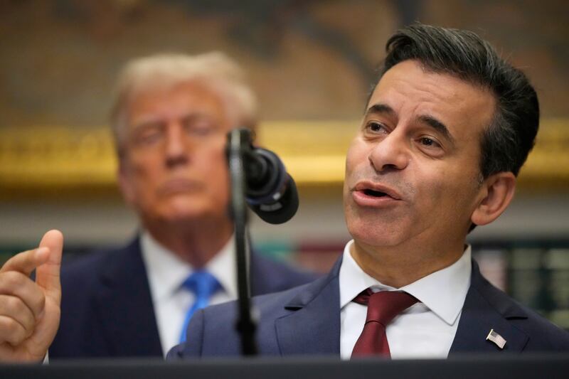 FILE - President Donald Trump listens as Dr. Marty Makary, commissioner of the Food and Drug Administration, speaks in the Roosevelt Room of the White House, Monday, Sept. 22, 2025, in Washington. (AP Photo/Mark Schiefelbein, file)