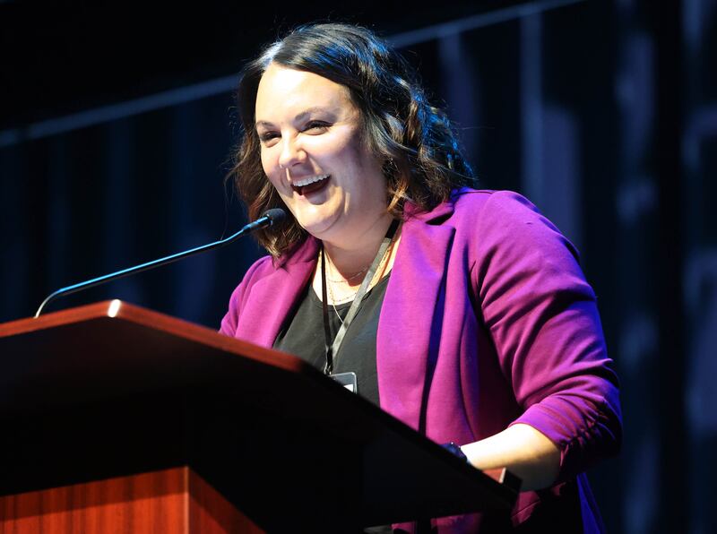 Devyn Grzywa smiles as she speaks after being introduced as this year’s Athena Award recipient Thursday, Oct. 16, 2025, during the 35th annual Athena and Women of Accomplishment Award Reception at the Egyptian Theatre in DeKalb.winner of the 2025 Athena Award, Devyn Grzywa