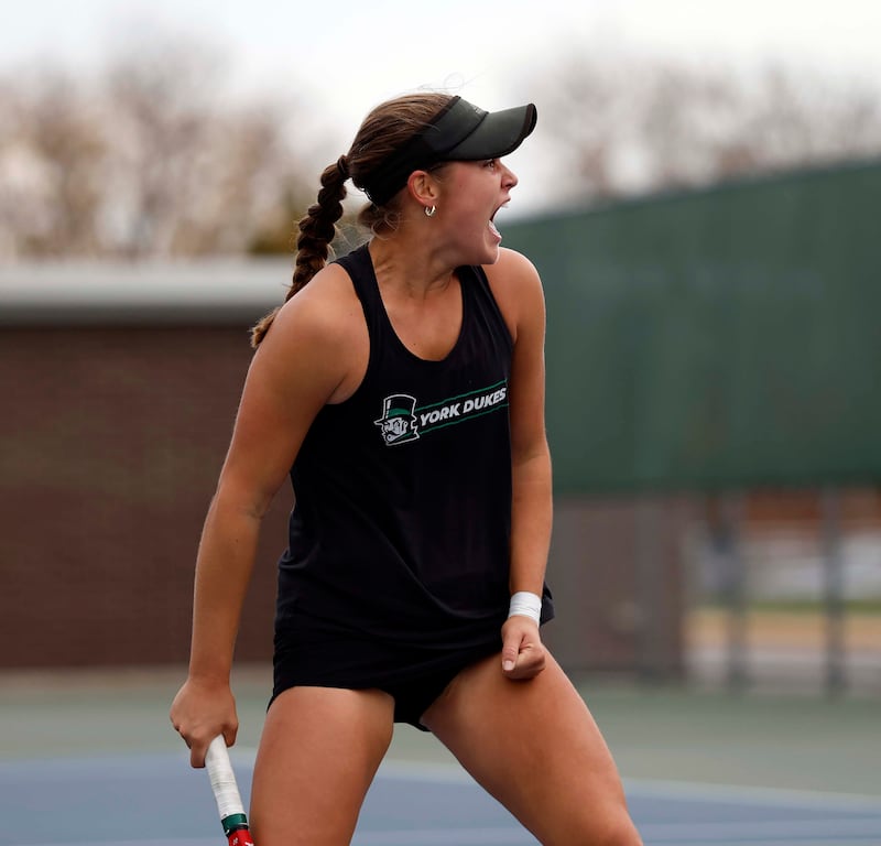 Caroline “CJ” Coan of York reacts after winning the 2A Singles Championship match Saturday, Oct. 25, 2025 at John Hersey High School in Arlington Heights.