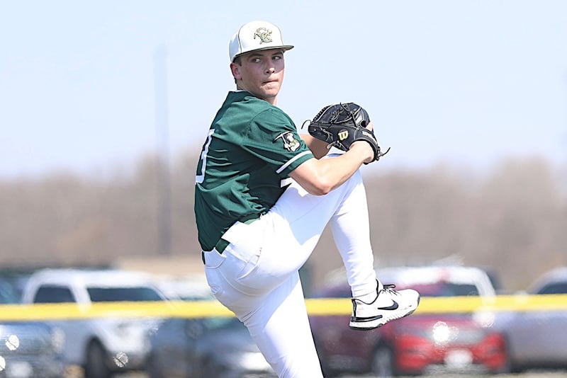 Coal City's Lance Cuddy delivers a pitch in a 4-3 win over Wilmington. Cuddy struck out 10 and also hit a solo homer.