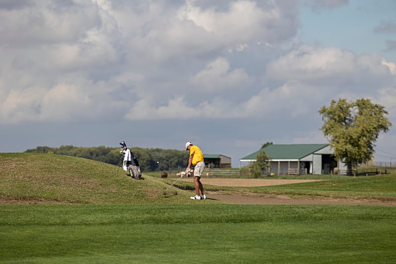 Sterling’s Mason Hubbard takes a shot toward the green on #1 Wednesday, Sept. 27, 2023 during the class 2A golf regionals at Deer Valley Country Club.